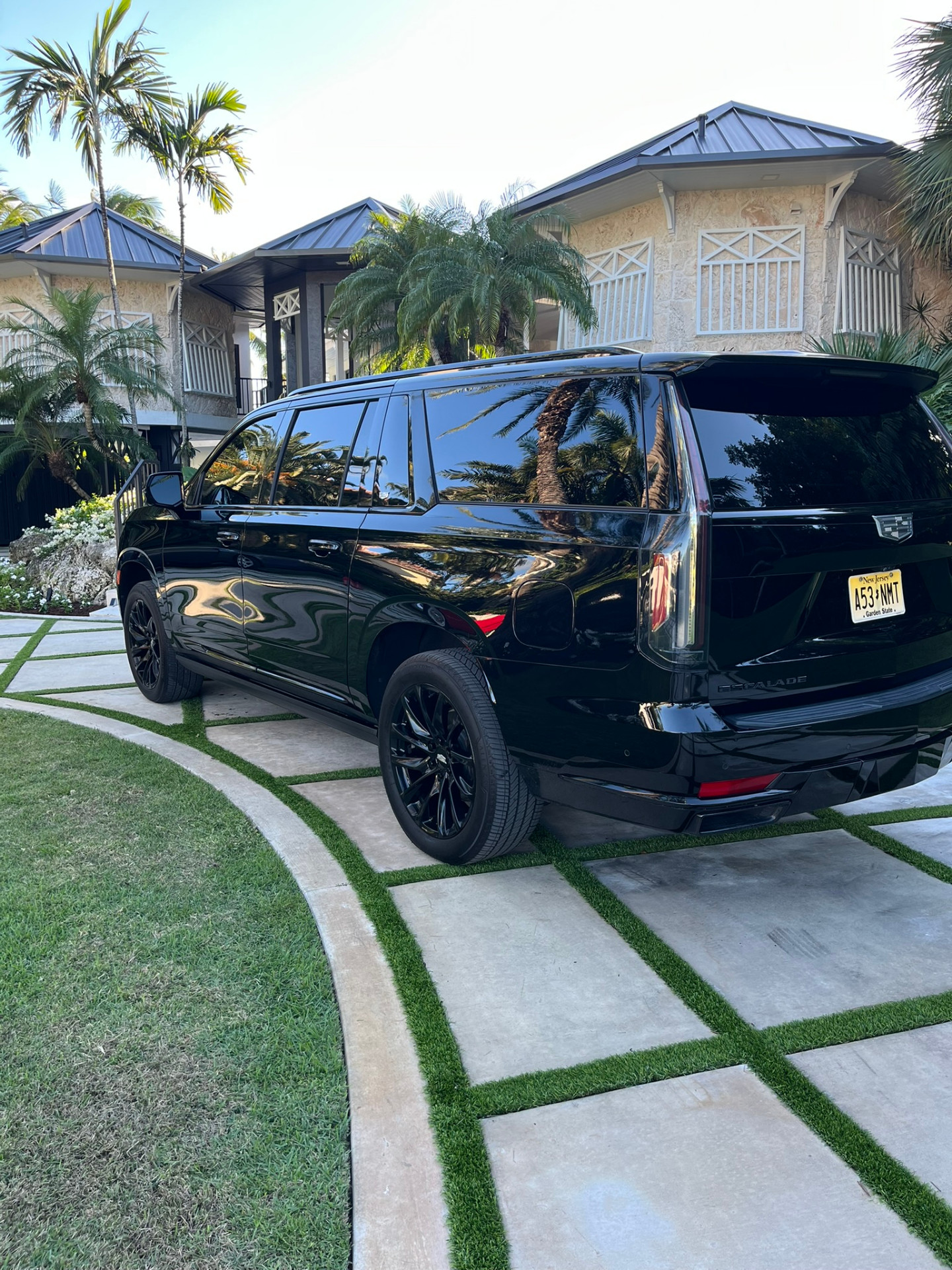 Cadillac Escalade black SUV mobile detailing and paint protection Miami